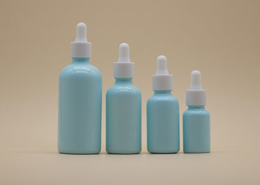 Μπλε Dropper ουσιαστικού πετρελαίου επιστρώματος άσπρο κεραμικό μπουκάλι μπουκαλιών για την προσωπική φροντίδα